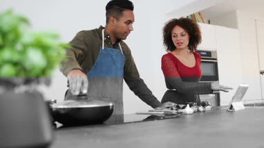 Adult male preparing using digital tablet