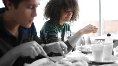 Tourists eating fish and chips