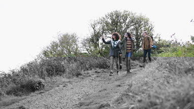 Group of friends on a hike to go camping