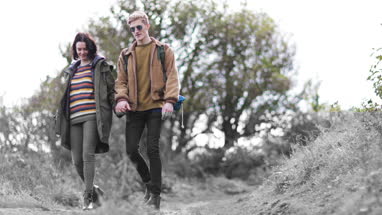 Couple walking outdoors in fall