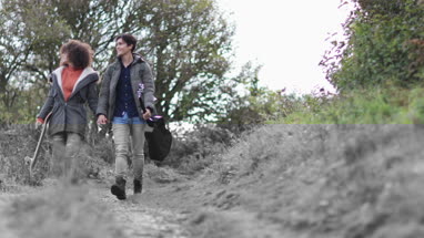 Couple walking outdoors in fall