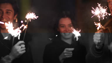 Friends having fun with sparklers 