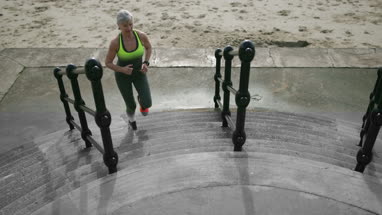 Senior woman giving Daughter a gift