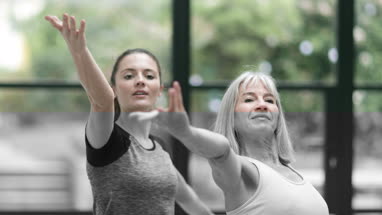 Mother and Daughter using a laptop together
