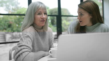 Senior couple on a videocall to daughter