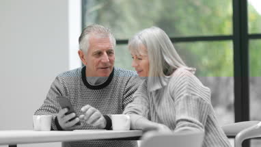 Senior businesswoman on smartphone