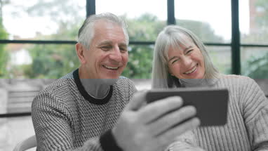 Senior businesswoman opening shop