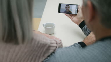 Senior businesswoman opening shop