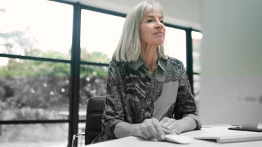 Senior couple with a gift