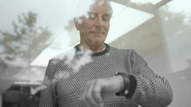 Senior man taking medicine