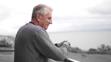 Senior man enjoying sea view