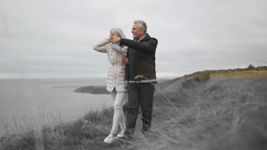 Senior couple walking outdoors