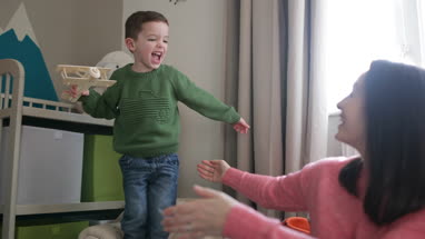 Boy giving his Mother a hug