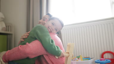 Boy hugging his Mother