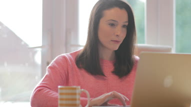 Mother working from home