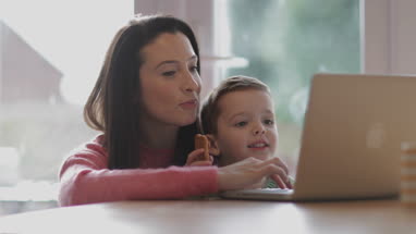 Mother and Son using laptop