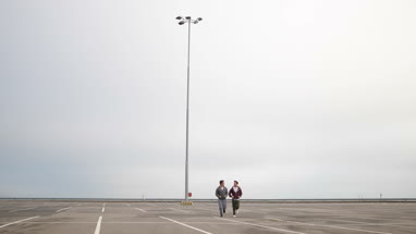 Male friends jogging outdoors