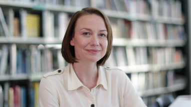 Close-up portrait of mature student in college library