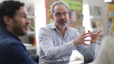 Senior male in a meeting