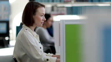 Portrait of businesswoman working at desk