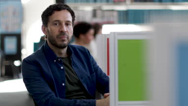 Portrait of businessman working at desk