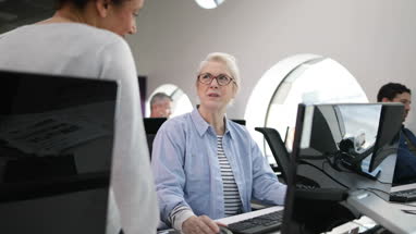 Senior woman on computing course