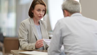 Financial advisor meeting with client