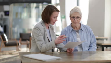 Financial advisor meeting with client