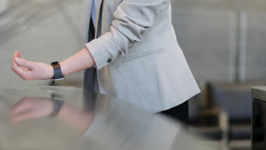 Smartwatch being scanned as security pass