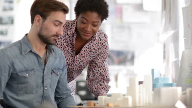 Architects looking at plans together