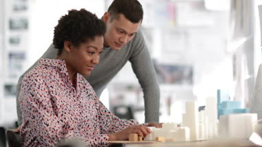 Architects looking at plans together