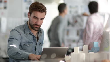 Designers working in an open plan office space