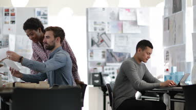 Designers working together in a creative office