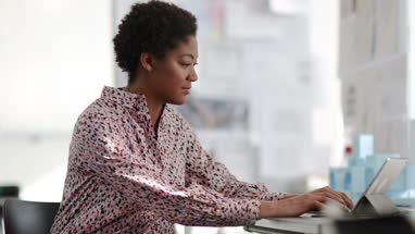 African american female working in creative office