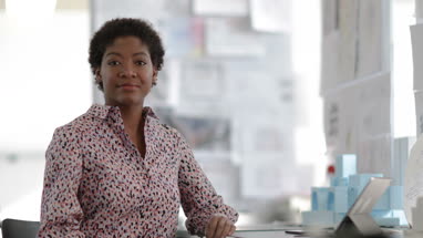 Portrait of African american female working in creative office