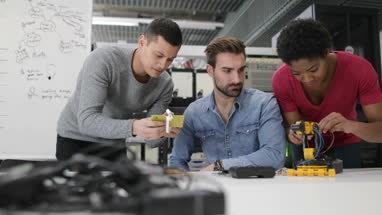 Colleagues working on robotics