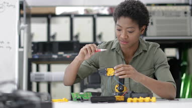 Female working on robotics