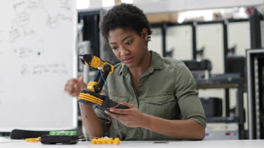Female working on robotics