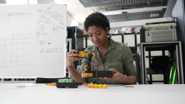 Female working on robotics
