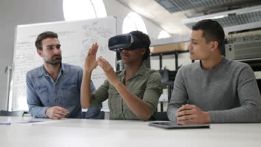 Team working on virtual reality headset