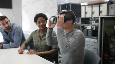 Team working on virtual reality headset