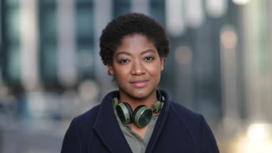 Young adult female walking in the city