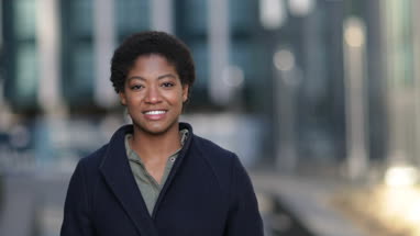 Young adult female walking in the city