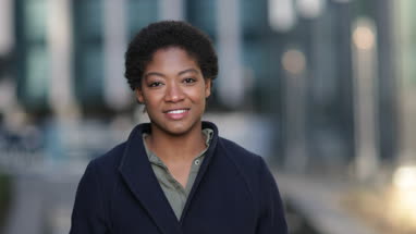 Young adult female walking in the city