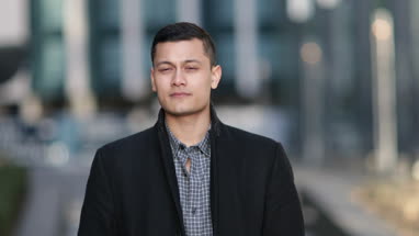 Young adult male in city