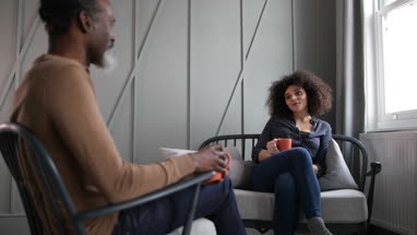 Daughter taking with Father at home