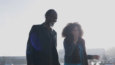 Father and Daughter walking outdoors