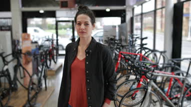 Portrait of a small business owner in a bicycle store