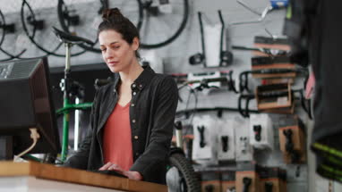 Portrait of small business owner in a bike store