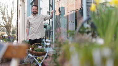 Portrait of a florist outside store